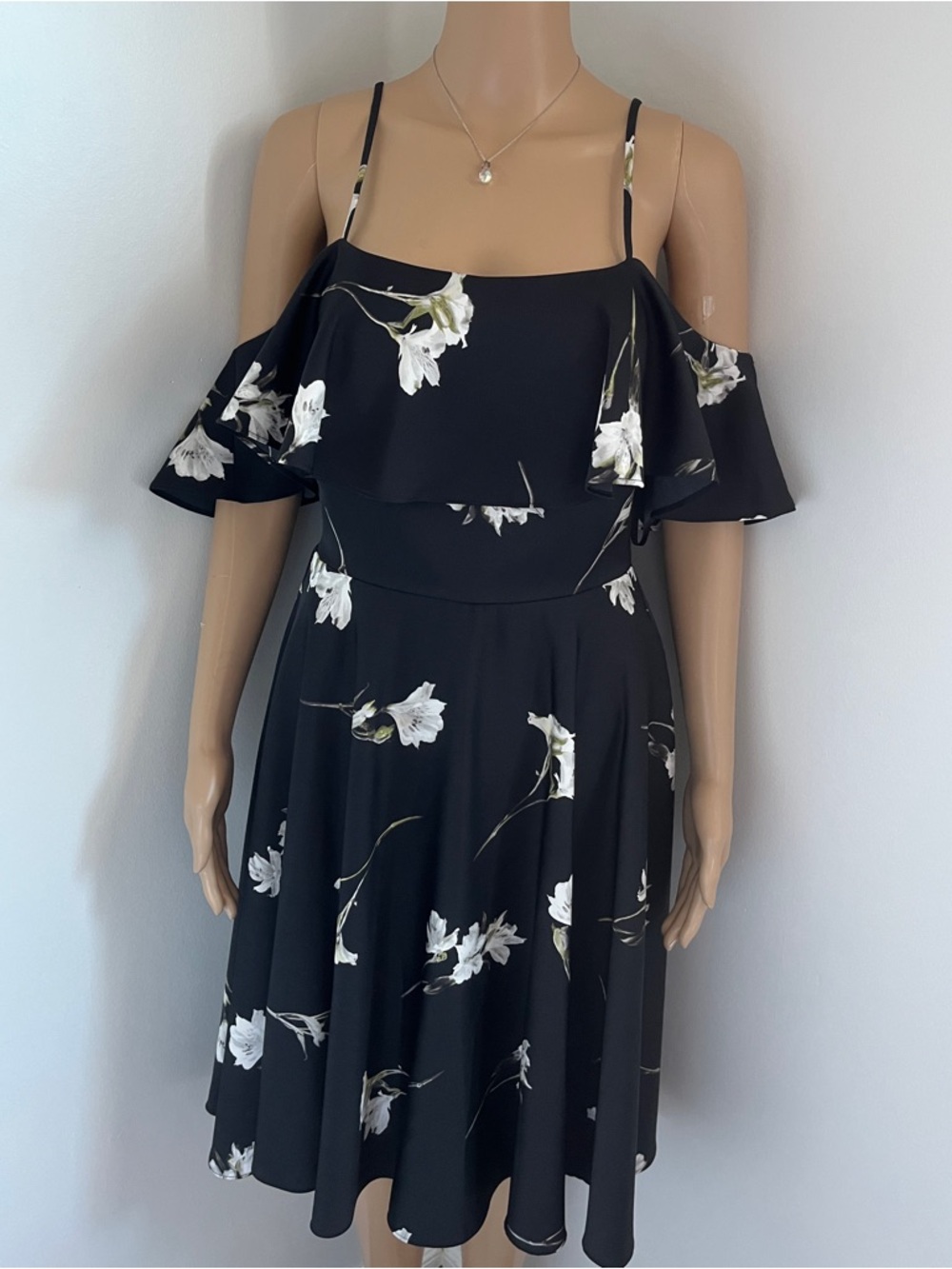 le chateau Black Midi Dress with White Floral Print and Cold-Shoulder Ruffle